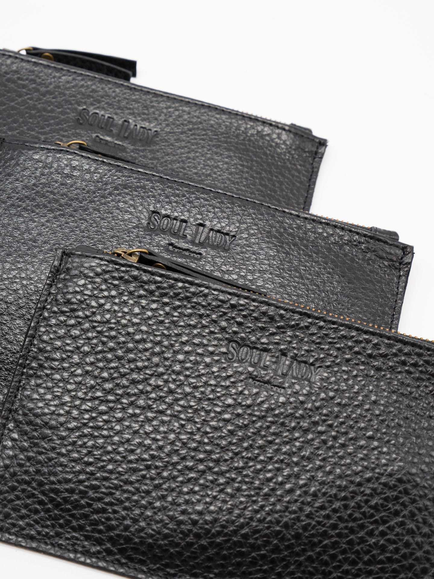 Cartera portatodo Negro piel grabada